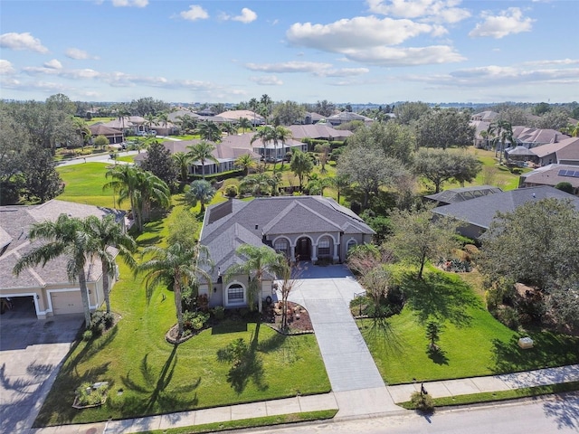 birds eye view of property with a residential view