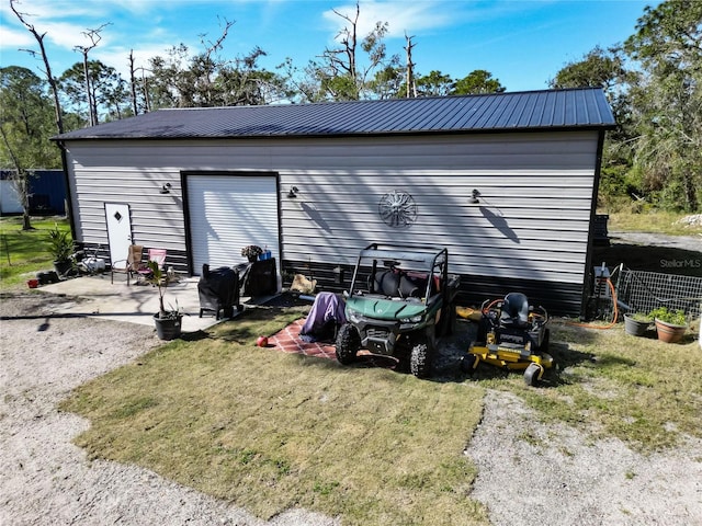 13215 Seminole Trl, Wimauma, FL 33598 - view of outbuilding with a lawn