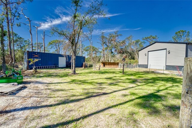 13215 Seminole Trl, Wimauma, FL 33598 - view of yard featuring an outbuilding