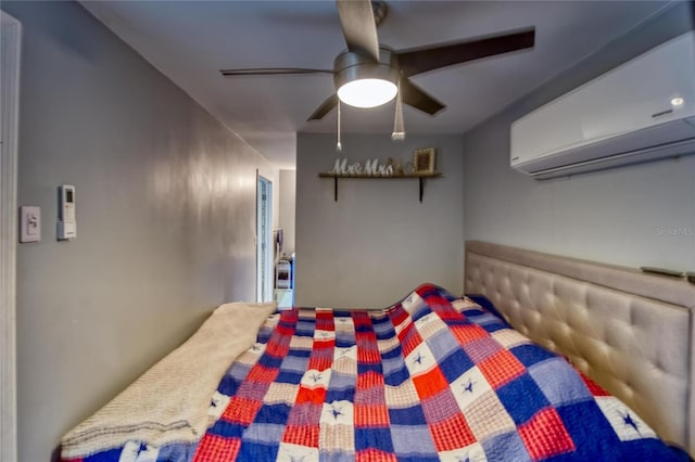 13215 Seminole Trl, Wimauma, FL 33598 - bedroom with a wall mounted air conditioner and ceiling fan
