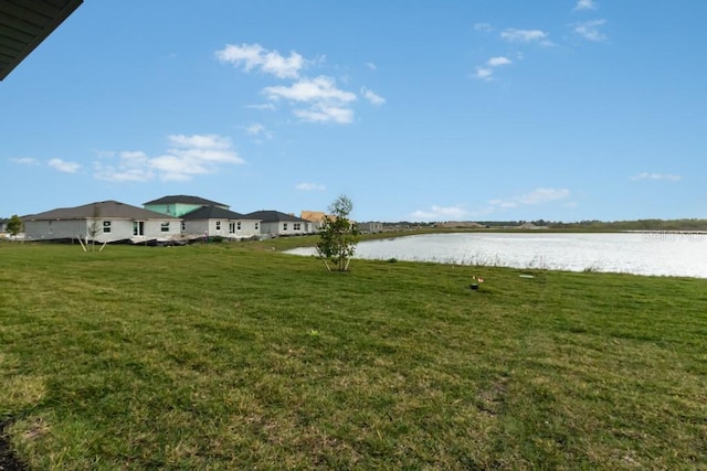 view of yard with a water view