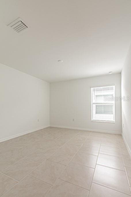 view of tiled empty room