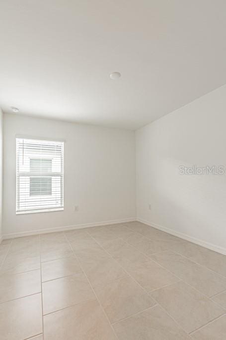 view of tiled empty room