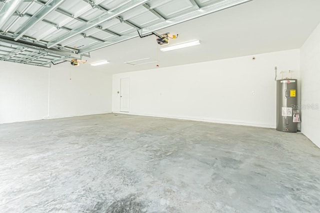 garage featuring a garage door opener and water heater