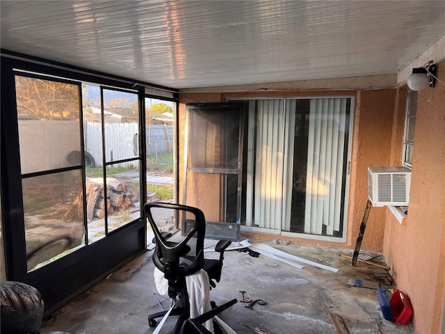 unfurnished sunroom featuring cooling unit