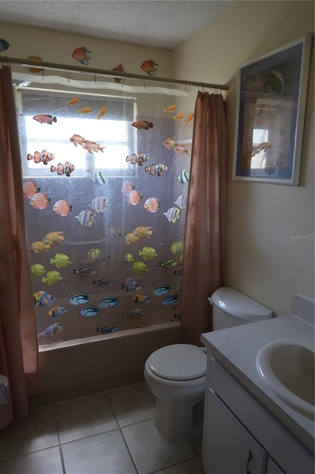 full bathroom with shower / tub combo, tile patterned flooring, vanity, a textured ceiling, and toilet