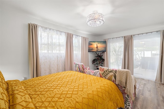 bedroom featuring wood-type flooring