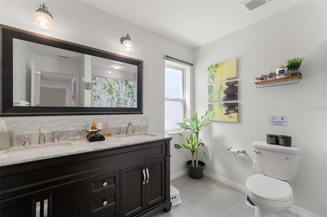 bathroom featuring decorative backsplash, vanity, toilet, tile patterned floors, and a shower with curtain