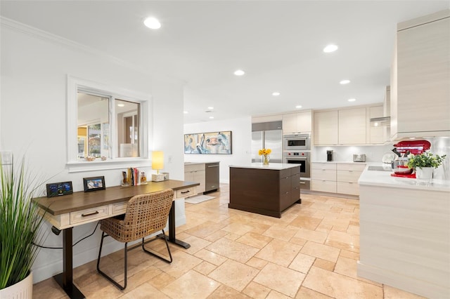 kitchen with appliances with stainless steel finishes and a center island