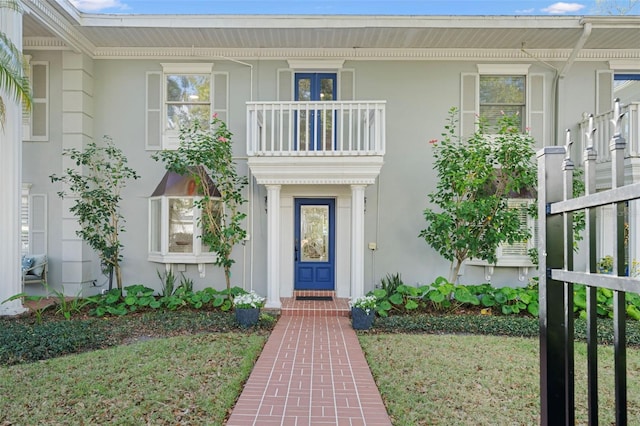 entrance to property featuring a balcony