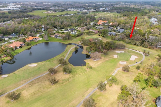 aerial view with view of golf course and a water view