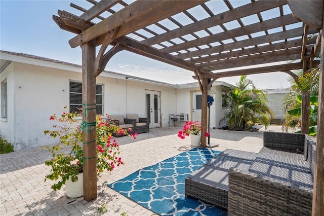 view of patio / terrace featuring french doors, central AC, an outdoor living space, and a pergola