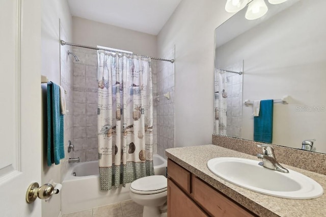 full bathroom featuring shower / bathtub combination with curtain, vanity, tile patterned flooring, and toilet