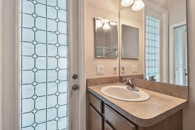 bathroom featuring vanity and walk in shower