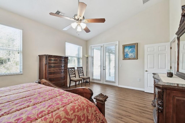 bedroom featuring dark wood-type flooring, ceiling fan, lofted ceiling, and access to exterior