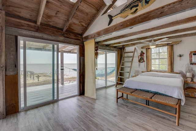 bedroom featuring vaulted ceiling with beams, wood finished floors, wood ceiling, and access to exterior