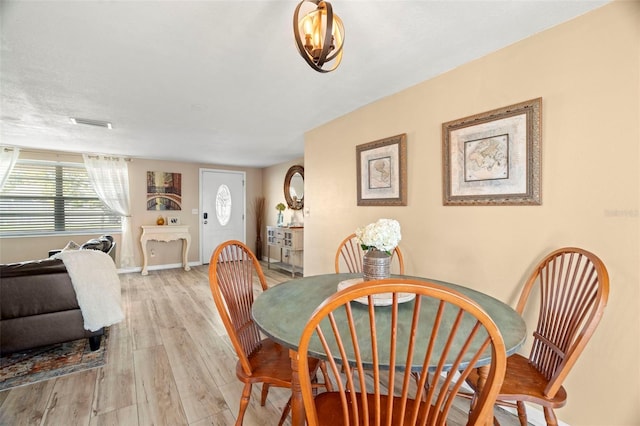 dining room featuring light hardwood / wood-style floors