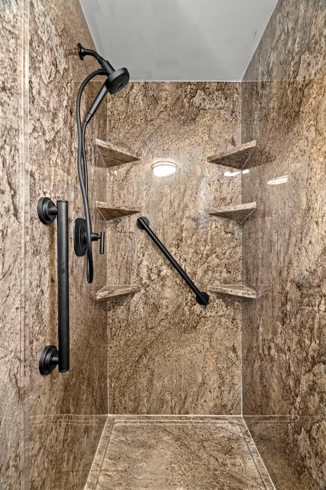 room details with a tile shower