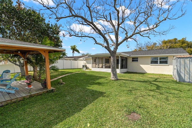 view of yard featuring a deck