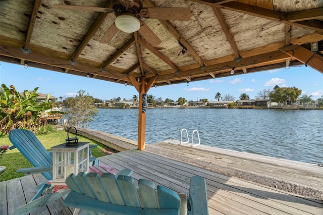 dock area featuring a gazebo and a water view