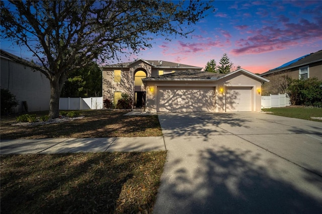 view of front of house with a garage