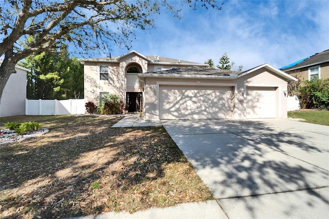 view of front of house with a garage