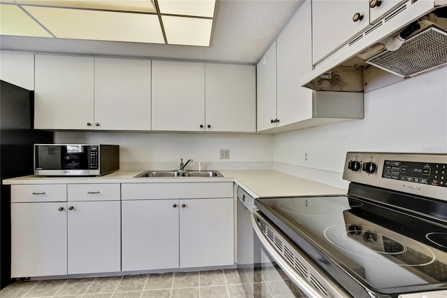 kitchen featuring sink, white cabinetry, and stainless steel appliances