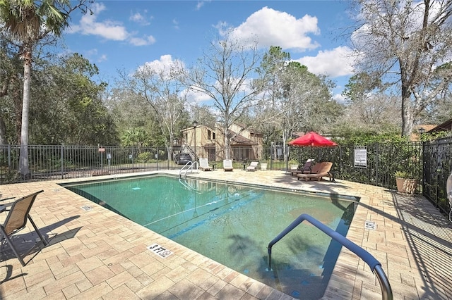 view of pool featuring a patio area