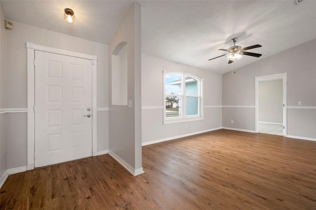 entrance foyer with lofted ceiling, dark hardwood / wood-style floors, and ceiling fan