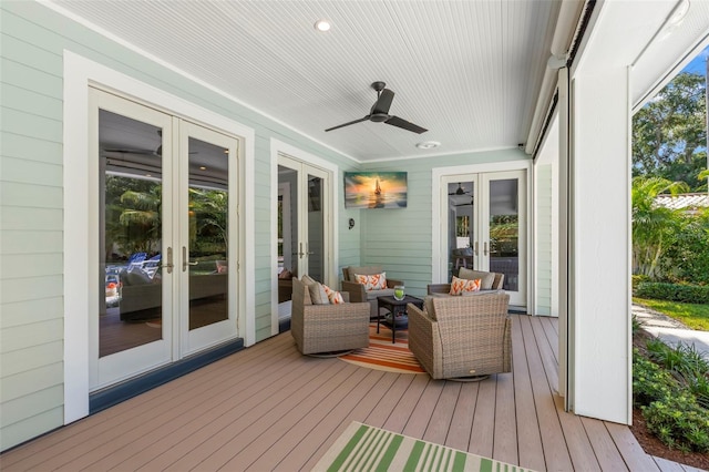 deck featuring an outdoor hangout area, french doors, and ceiling fan