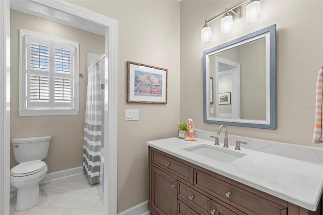 bathroom featuring vanity, toilet, curtained shower, and tile patterned flooring