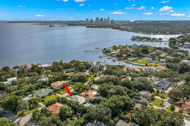 birds eye view of property featuring a water view