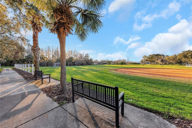 view of home's community featuring a lawn