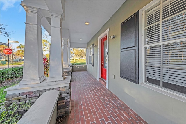 view of patio featuring a porch