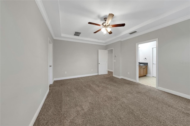 unfurnished bedroom with light carpet, visible vents, and baseboards