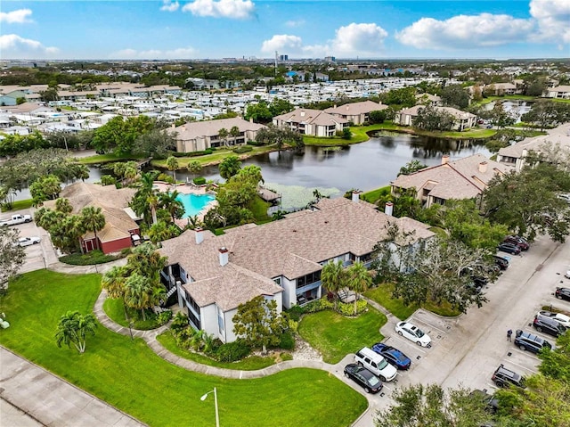 drone / aerial view with a water view