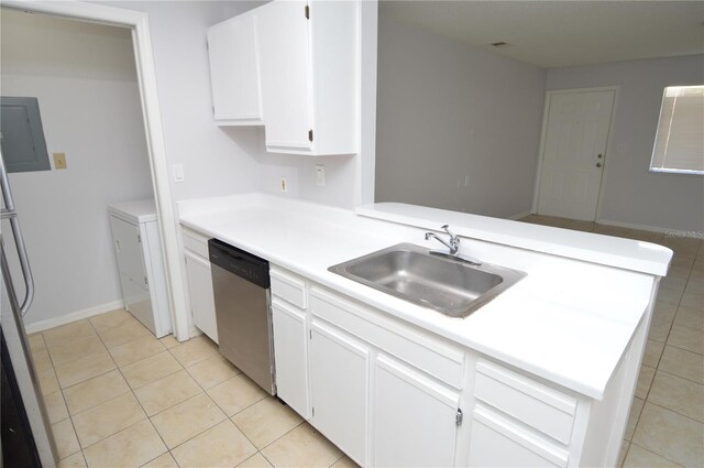 10263 Gandy Blvd N Unit 105, Saint Petersburg, FL 33702 - kitchen featuring stainless steel dishwasher, a sink, light tile patterned floors, and white cabinets
