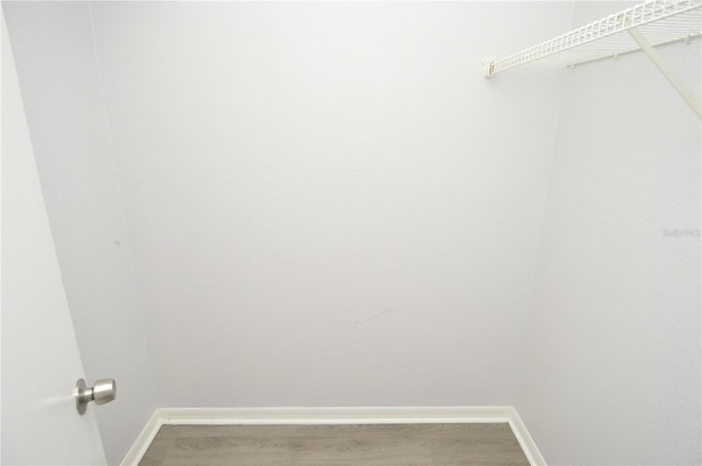 10263 Gandy Blvd N Unit 105, Saint Petersburg, FL 33702 - spacious closet featuring wood finished floors