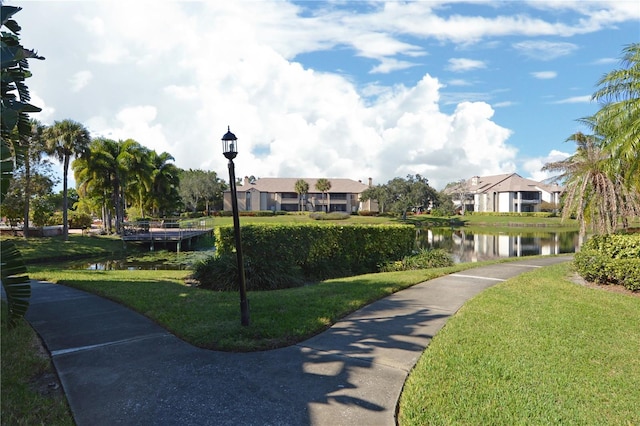10263 Gandy Blvd N Unit 105, Saint Petersburg, FL 33702 - view of property's community with a water view, a lawn, and a residential view