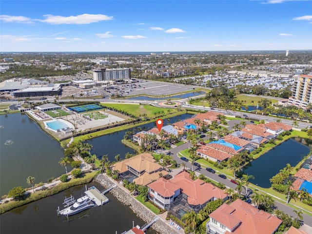 birds eye view of property featuring a water view