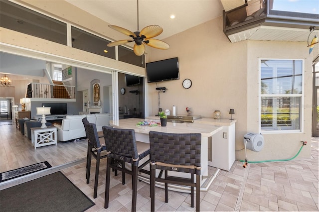 view of patio / terrace featuring a ceiling fan