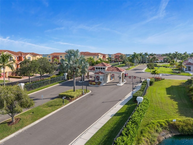 view of street featuring a residential view and curbs