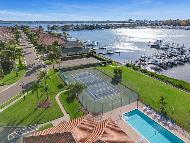 birds eye view of property featuring a water view