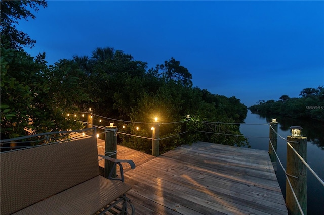 view of dock with a wooden deck