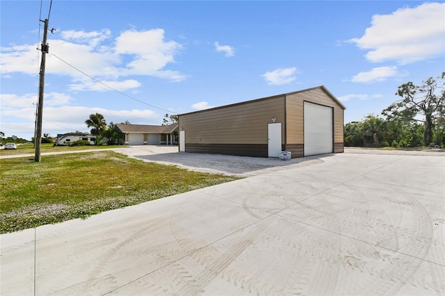 garage featuring a yard