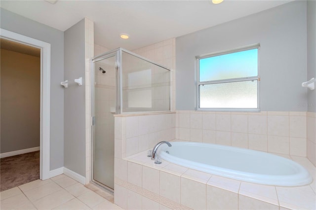 bathroom featuring tile patterned flooring and independent shower and bath