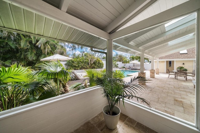 view of patio with a fenced in pool