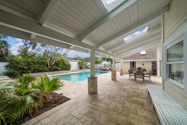 view of pool featuring a patio