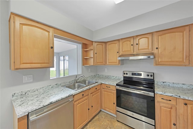 kitchen with light brown cabinetry, under cabinet range hood, light stone counters, a sink, and stainless steel appliances
