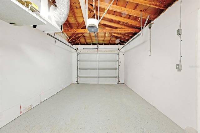 garage featuring a garage door opener